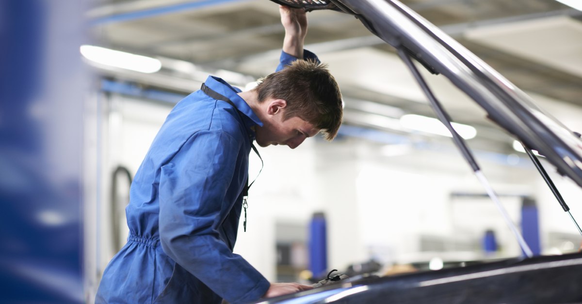 car repairman in store