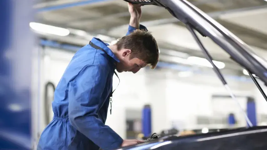 car repairman in store